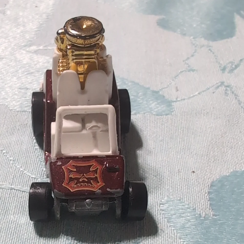 Gold and White Toy Car